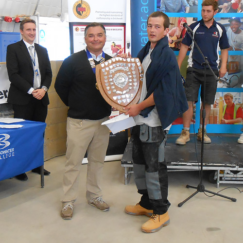 Senior winner of the western competiton, Matt Sandry, (Cornwall College) accepts his award from western competition secretary, Andy Ballard