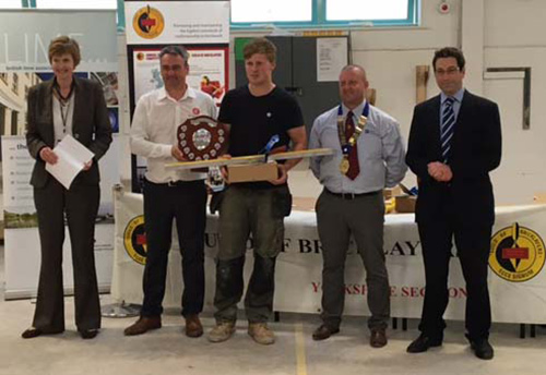Junior heat winner, Lewis Greenwood, receives his awards from (left to right) Alison Birkinshaw principal, York College, Guy Armitage, York Handmade Bricks, sponsor, Charlie Young, Andrew Bannister, Yorkshire section guild chairman
and Richard Urwin, Mitchell and Urwin, sponsor  
