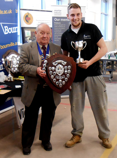 Guild of Bricklayers West Midlands chairman, Vic Scriven, presents the junior section awards to Connor Keyte of Morton Morrel College.
